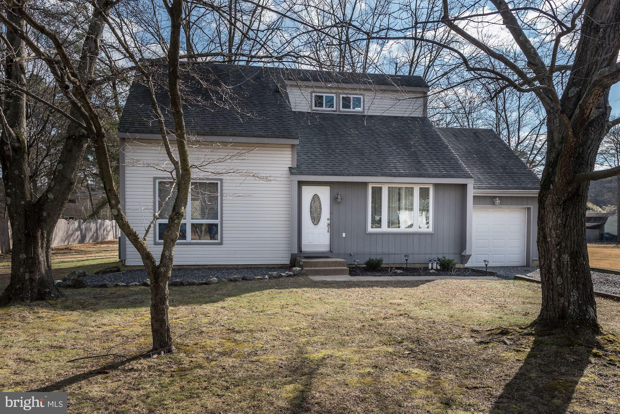 2418 Hopewell Road Marlton, NJ 08053 - Photo 3 of 42 a front view of a house with garden
