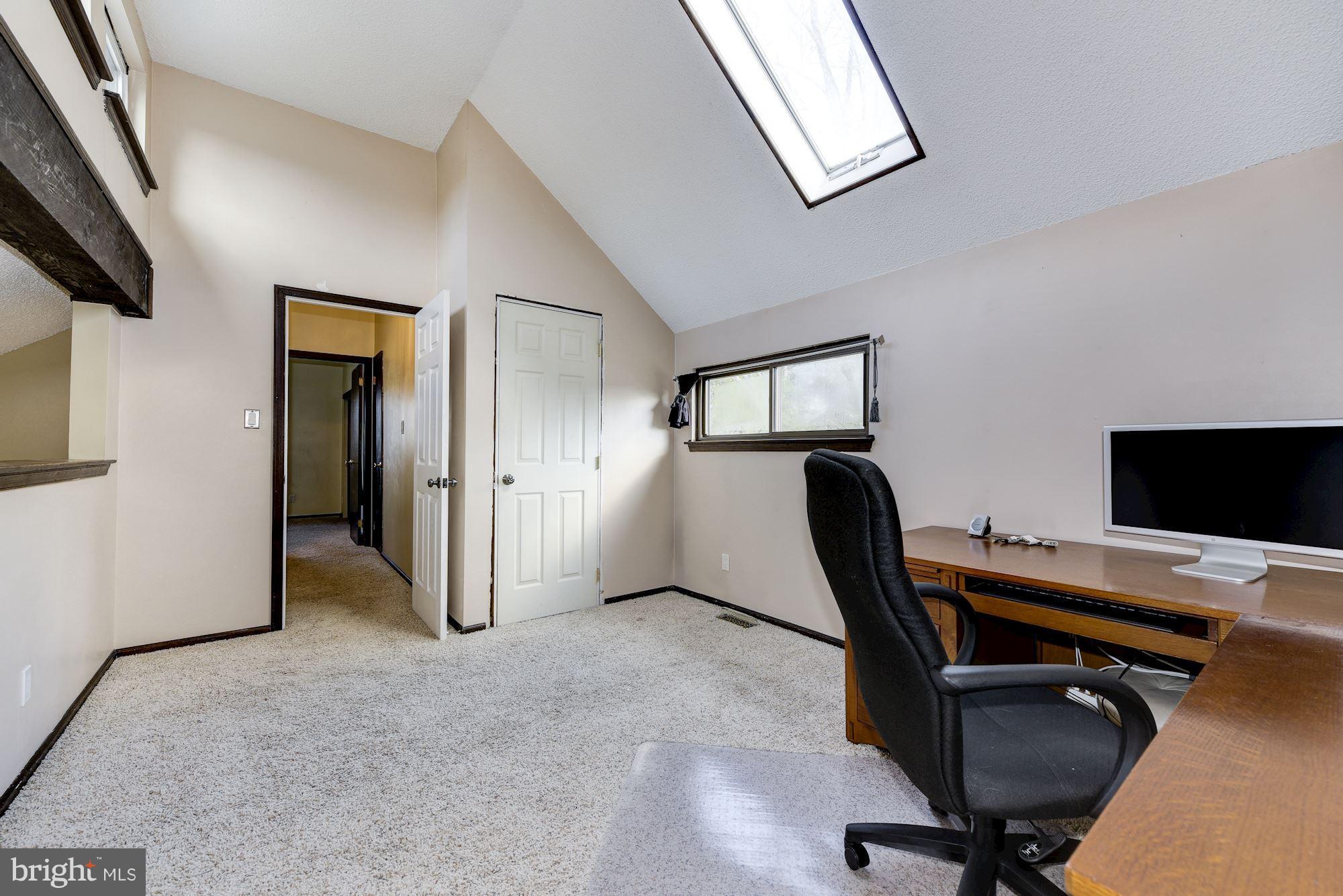 2418 Hopewell Road Marlton, NJ 08053 - Photo 25 of 42 a view of a workspace with furniture and a window
