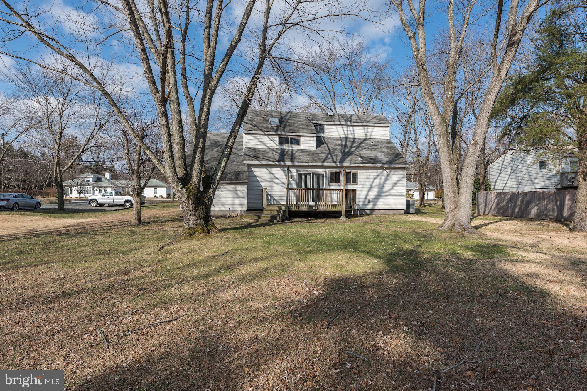 2418 Hopewell Road Marlton, NJ 08053 - Photo 33 of 42 a view of a yard with a large tree
