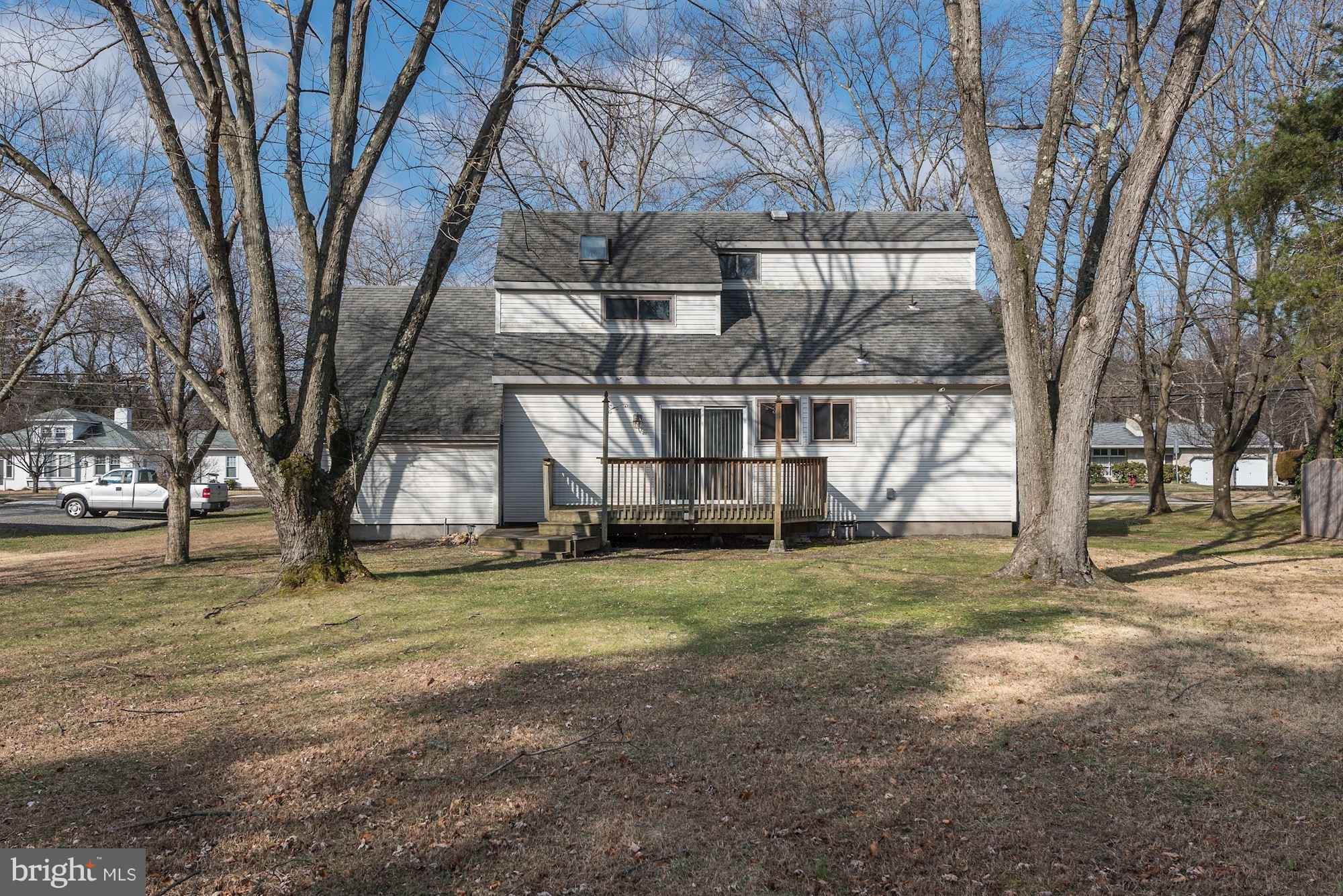 2418 Hopewell Road Marlton, NJ 08053 - Photo 35 of 42 a view of a yard with a large tree