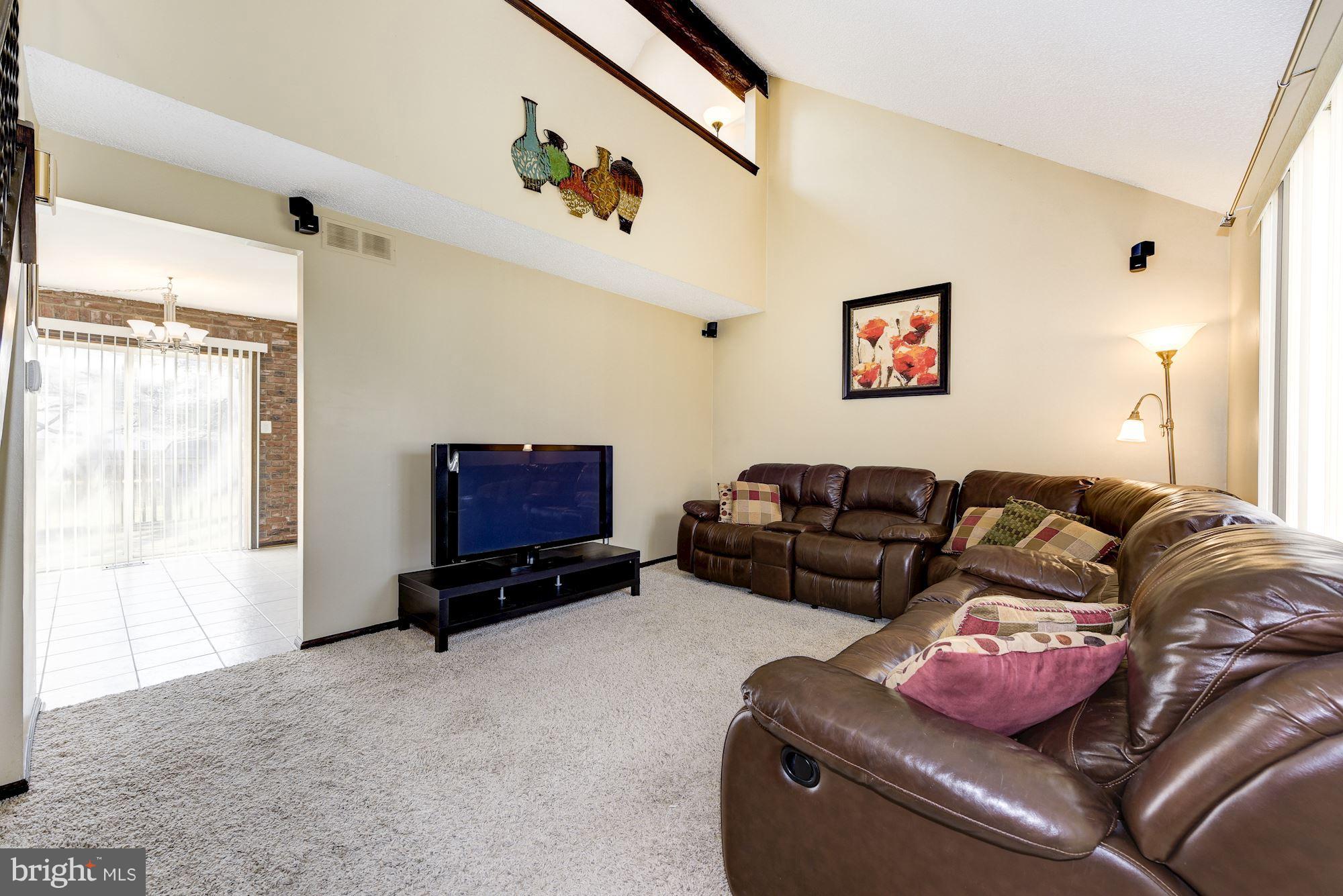 2418 Hopewell Road Marlton, NJ 08053 - Photo 5 of 42 a living room with furniture a couch and a window