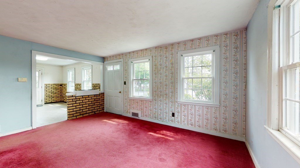 314 Burncoat Street Worcester, MA 01606 - Photo 12 of 29 an empty room with windows