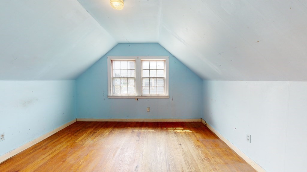 314 Burncoat Street Worcester, MA 01606 - Photo 22 of 29 an empty room with wooden floor and windows