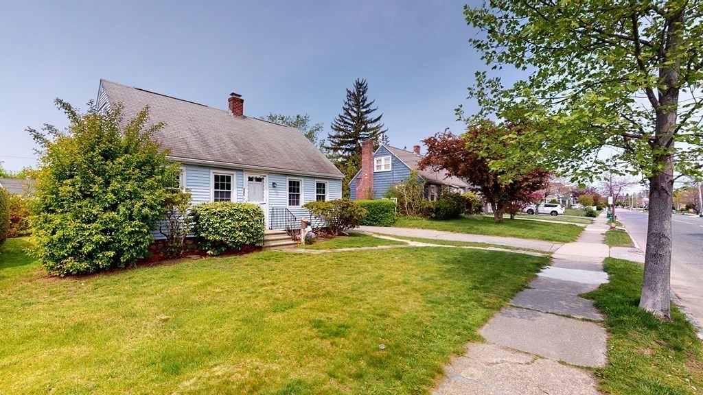 314 Burncoat Street Worcester, MA 01606 - Photo 3 of 29 a front view of house with yard and green space