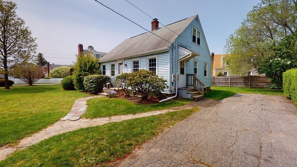 314 Burncoat Street Worcester, MA 01606 - Photo 4 of 29 a front view of house with yard and green space