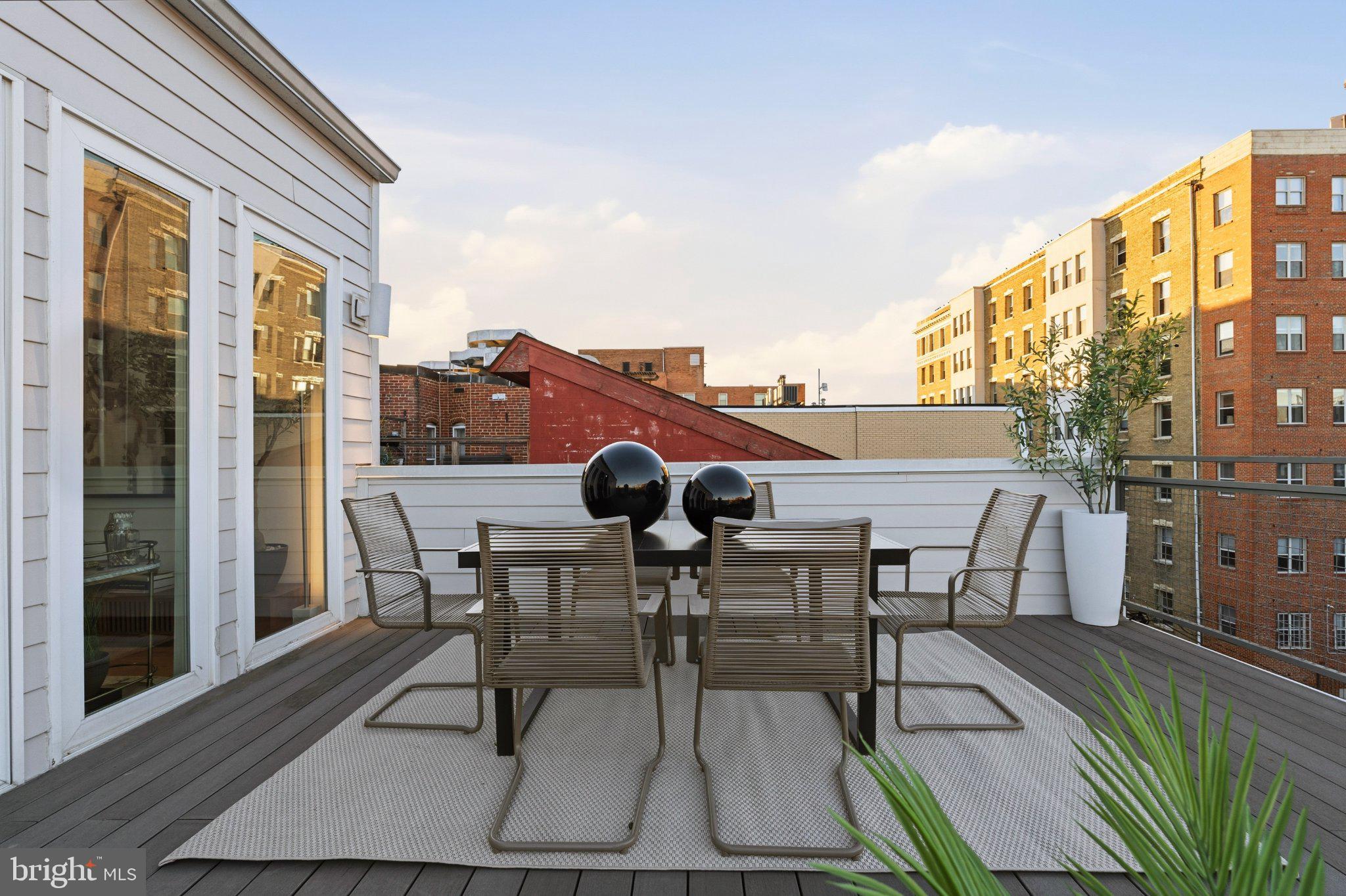 1837 Kalorama Road Northwest, Unit F Washington, DC 20009 - Photo 32 of 42 Urban rooftop retreat with city views.