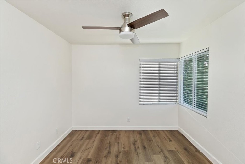 19912 Westerly Drive Riverside, CA 92508 - Photo 14 of 22 a view of a room with wooden floor and windows
