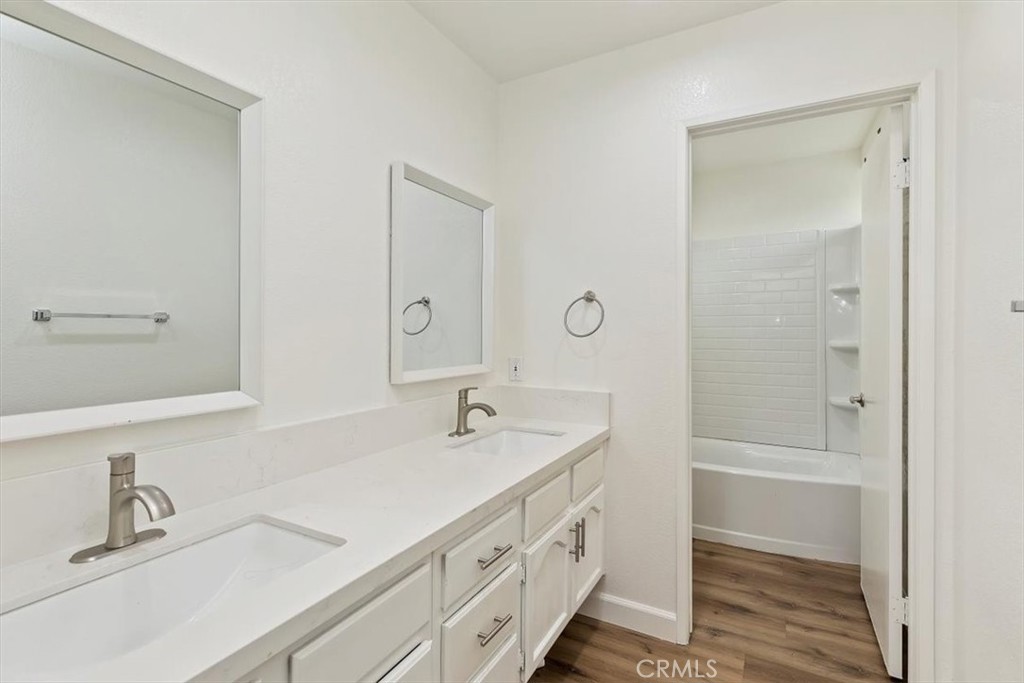 19912 Westerly Drive Riverside, CA 92508 - Photo 16 of 22 a bathroom with a sink and a mirror