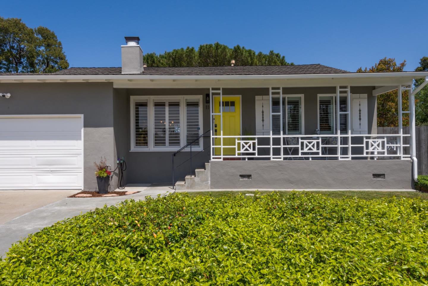 11 Meadow Court San Mateo, CA 94403 - Photo 1 of 31 a front view of a house with a yard