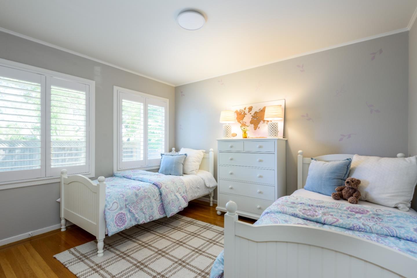 11 Meadow Court San Mateo, CA 94403 - Photo 13 of 31 a bedroom with a bed and window