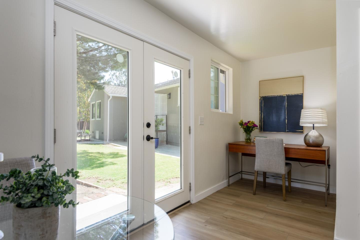 11 Meadow Court San Mateo, CA 94403 - Photo 19 of 31 a living room with furniture and a potted plant