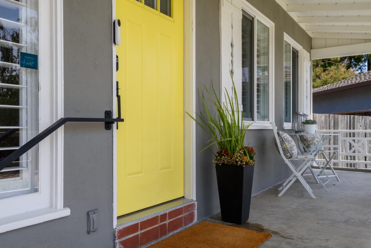 11 Meadow Court San Mateo, CA 94403 - Photo 2 of 31 a view of a porch with chairs and potted plants