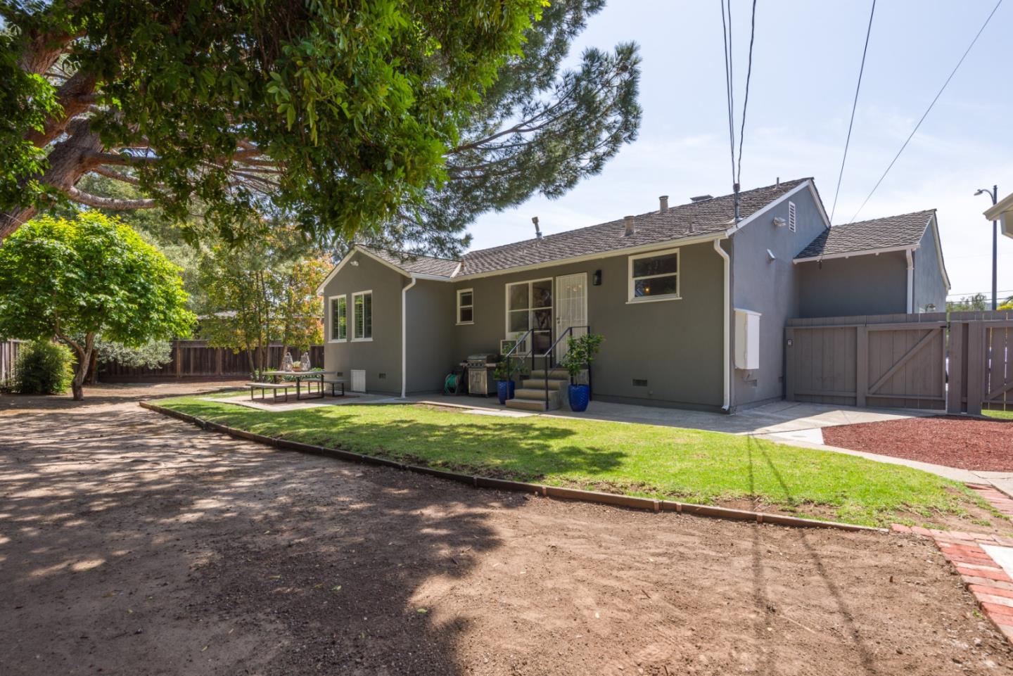 11 Meadow Court San Mateo, CA 94403 - Photo 24 of 31 a view of a house with a yard and large tree
