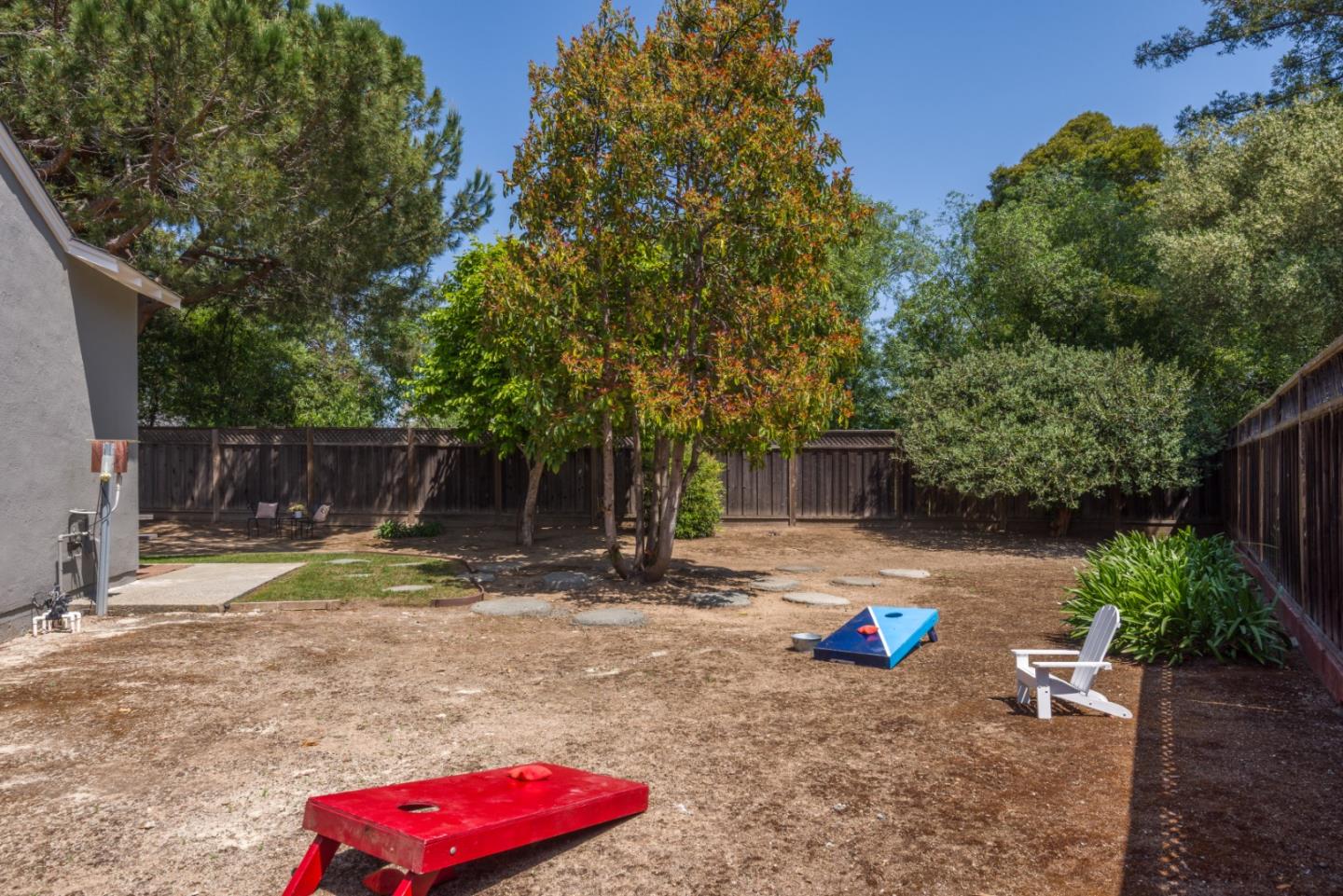 11 Meadow Court San Mateo, CA 94403 - Photo 26 of 31 a backyard of a house with barbeque oven