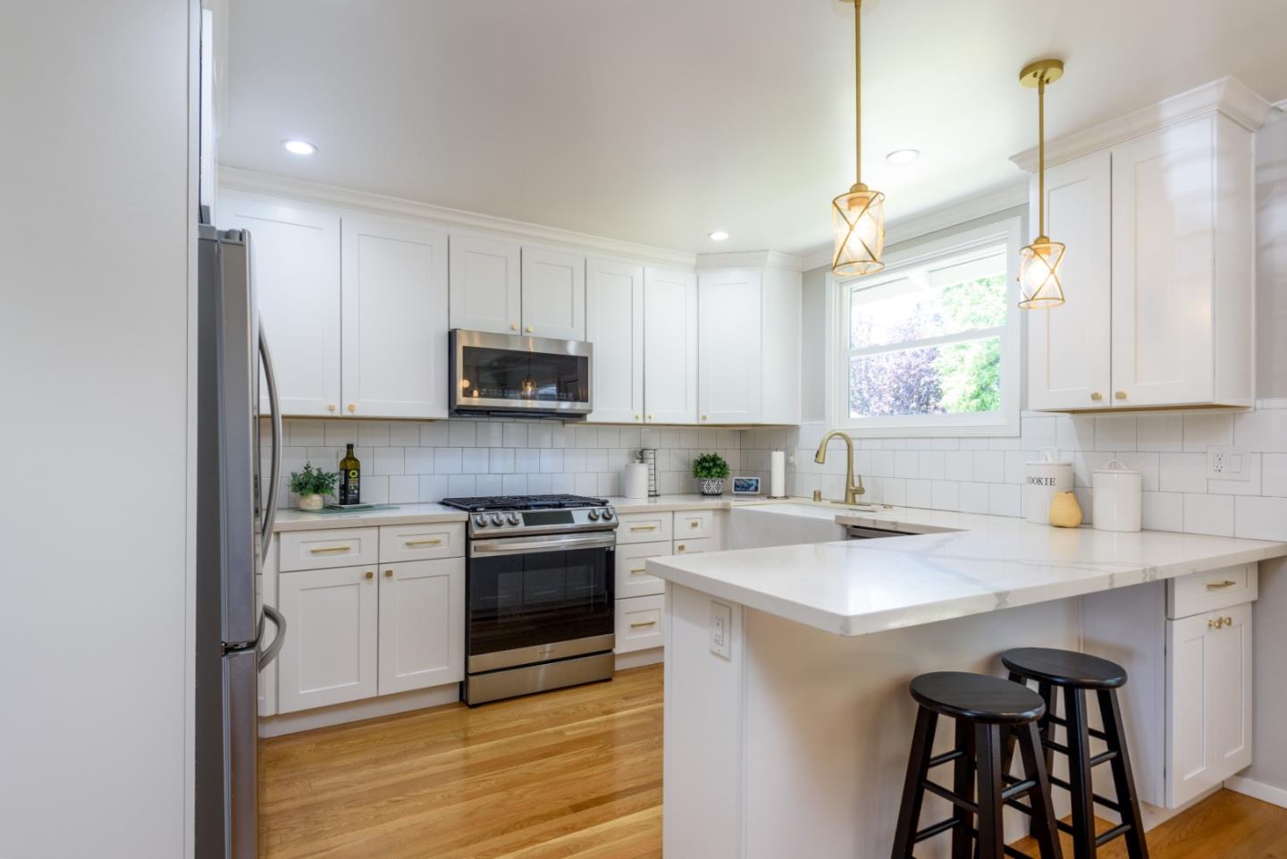 11 Meadow Court San Mateo, CA 94403 - Photo 8 of 31 a kitchen with a sink cabinets and window