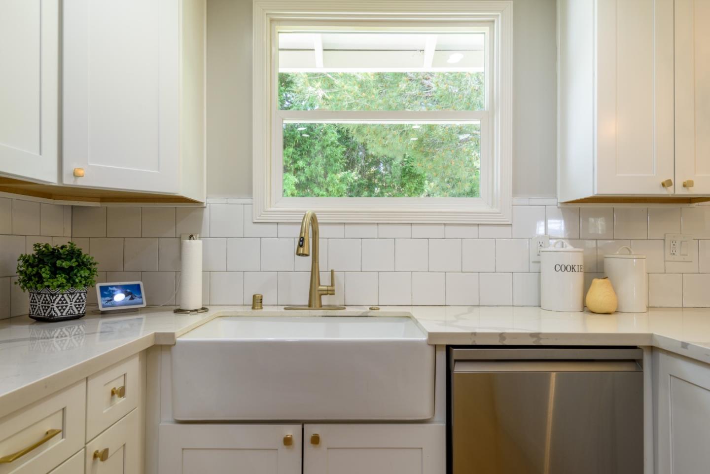 11 Meadow Court San Mateo, CA 94403 - Photo 10 of 31 a kitchen with a sink cabinets and window