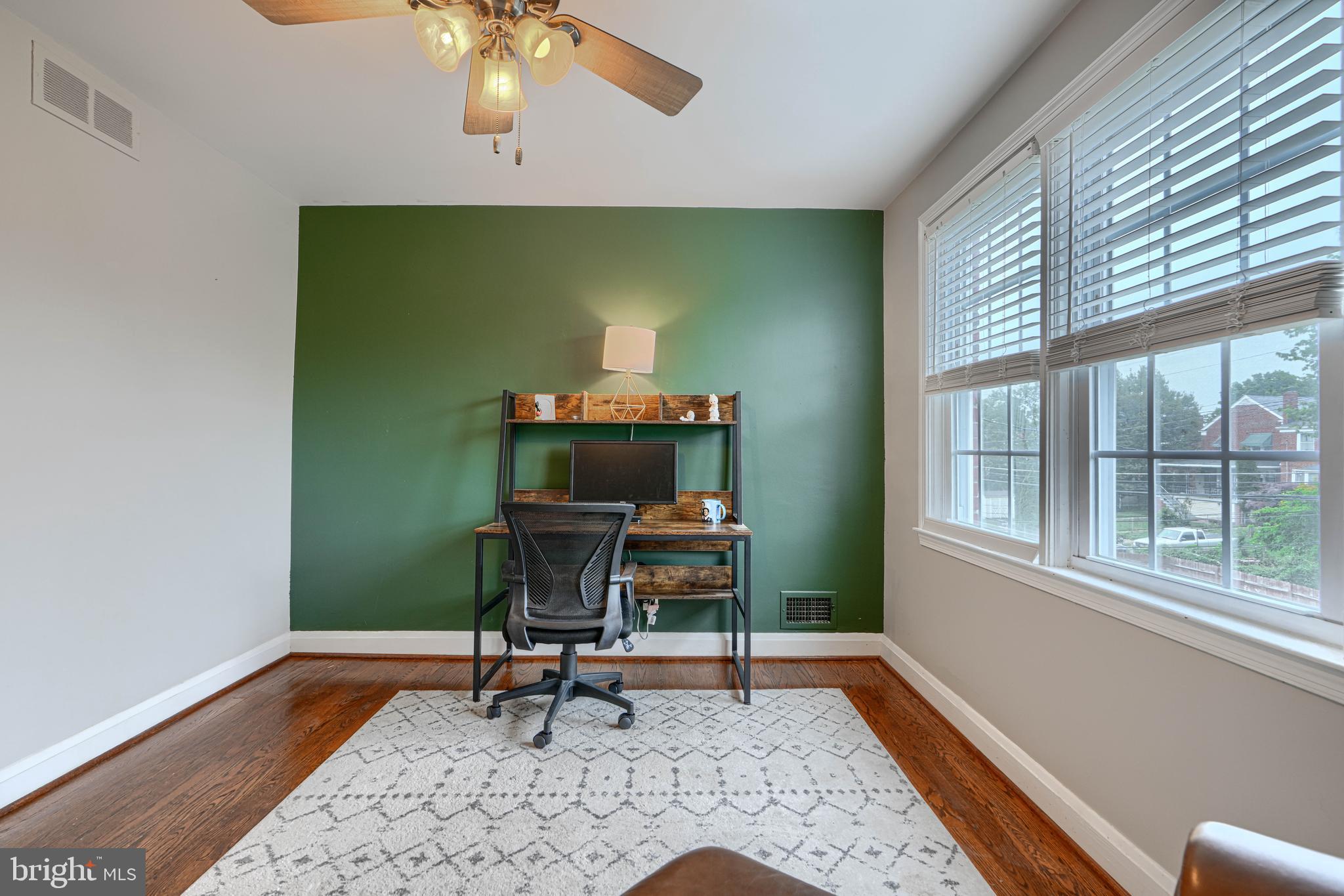 8132 Pleasant Plains Road Towson, MD 21286 - Photo 23 of 55 a view of a workspace with furniture and a window
