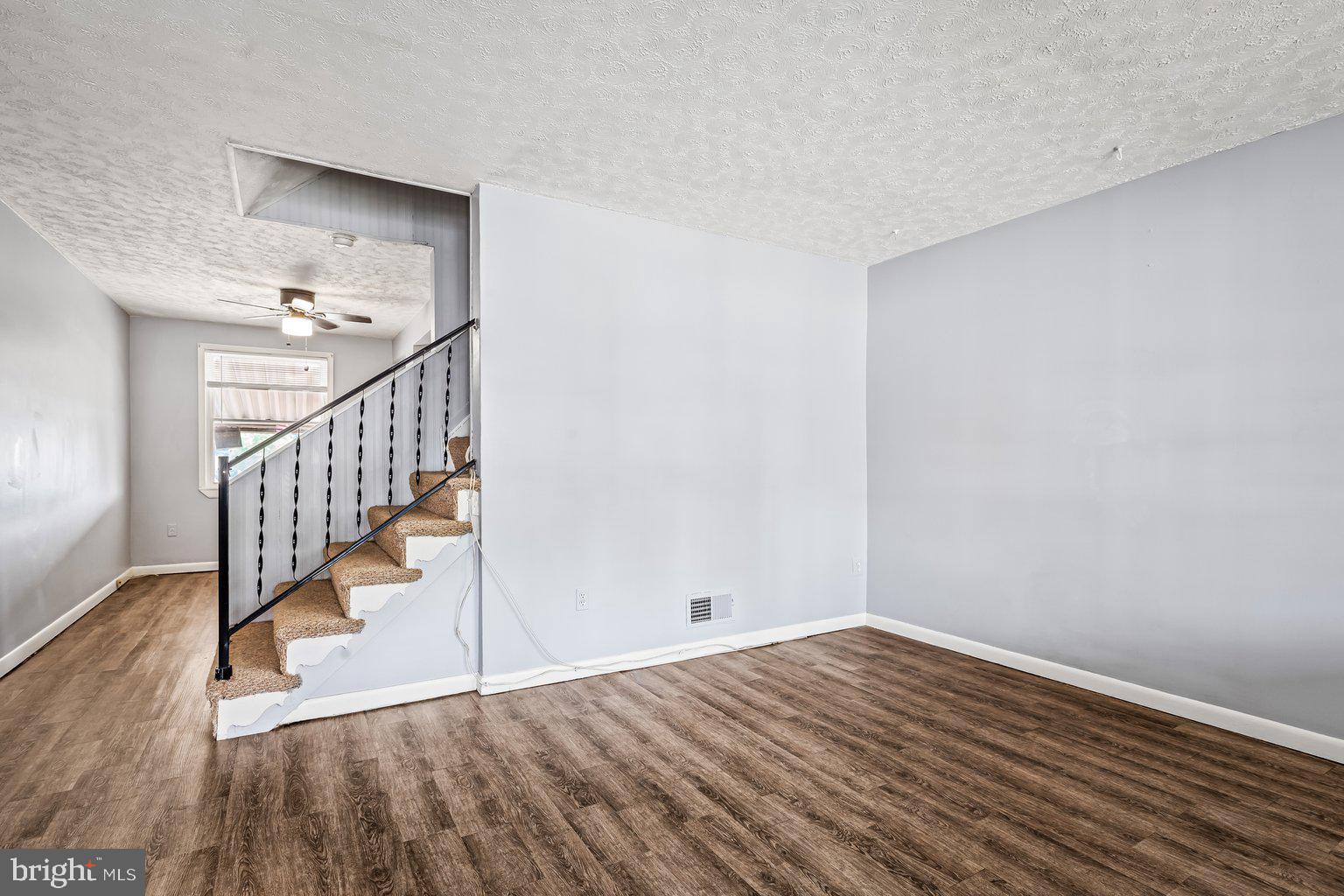 8448 Kavanagh Road Dundalk, MD 21222 - Photo 5 of 19 I'm a stylish center staircase home