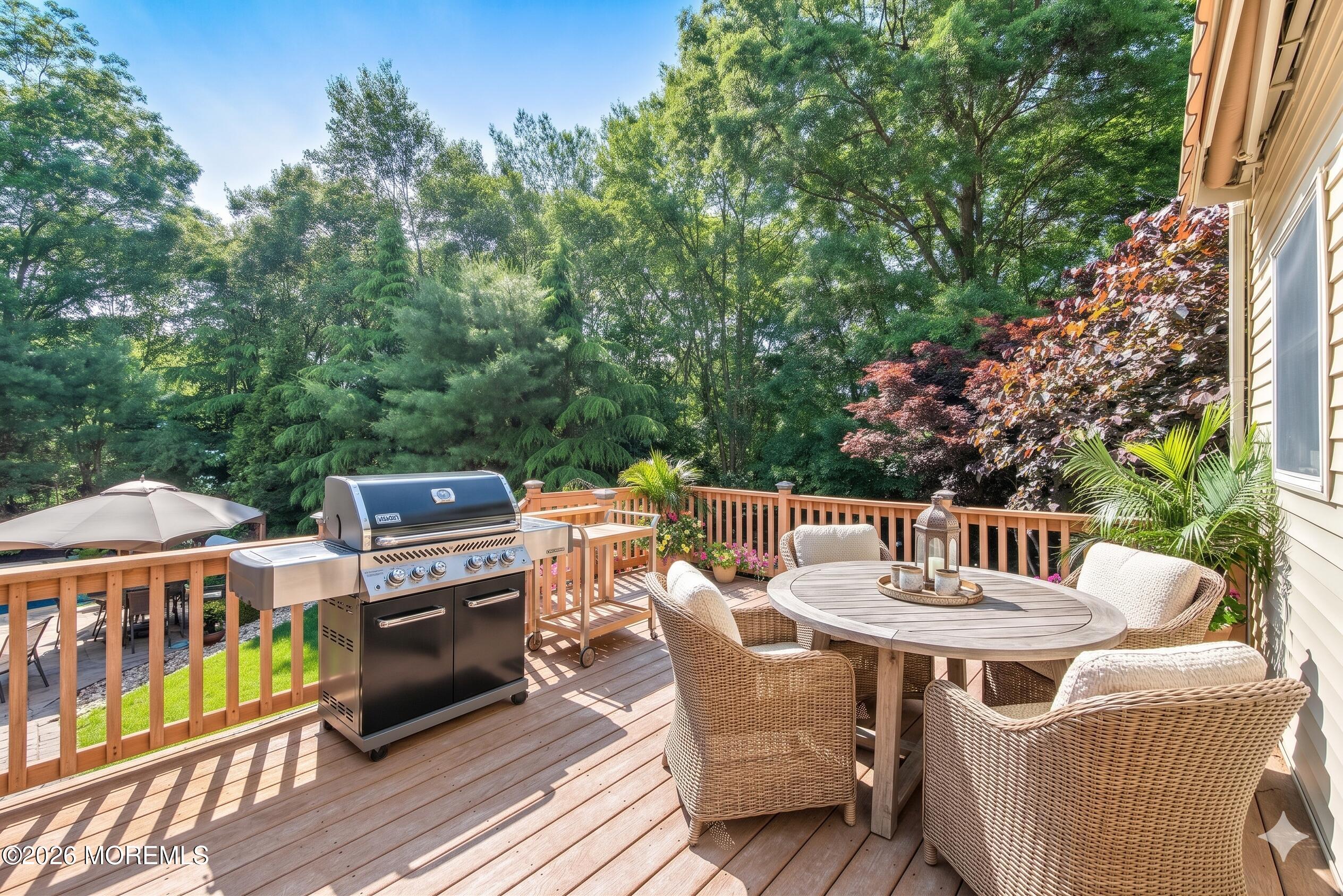 2 Mehar Court Jackson, NJ 08527 - Photo 12 of 47 a view of a patio with table and chairs with wooden floor and fence