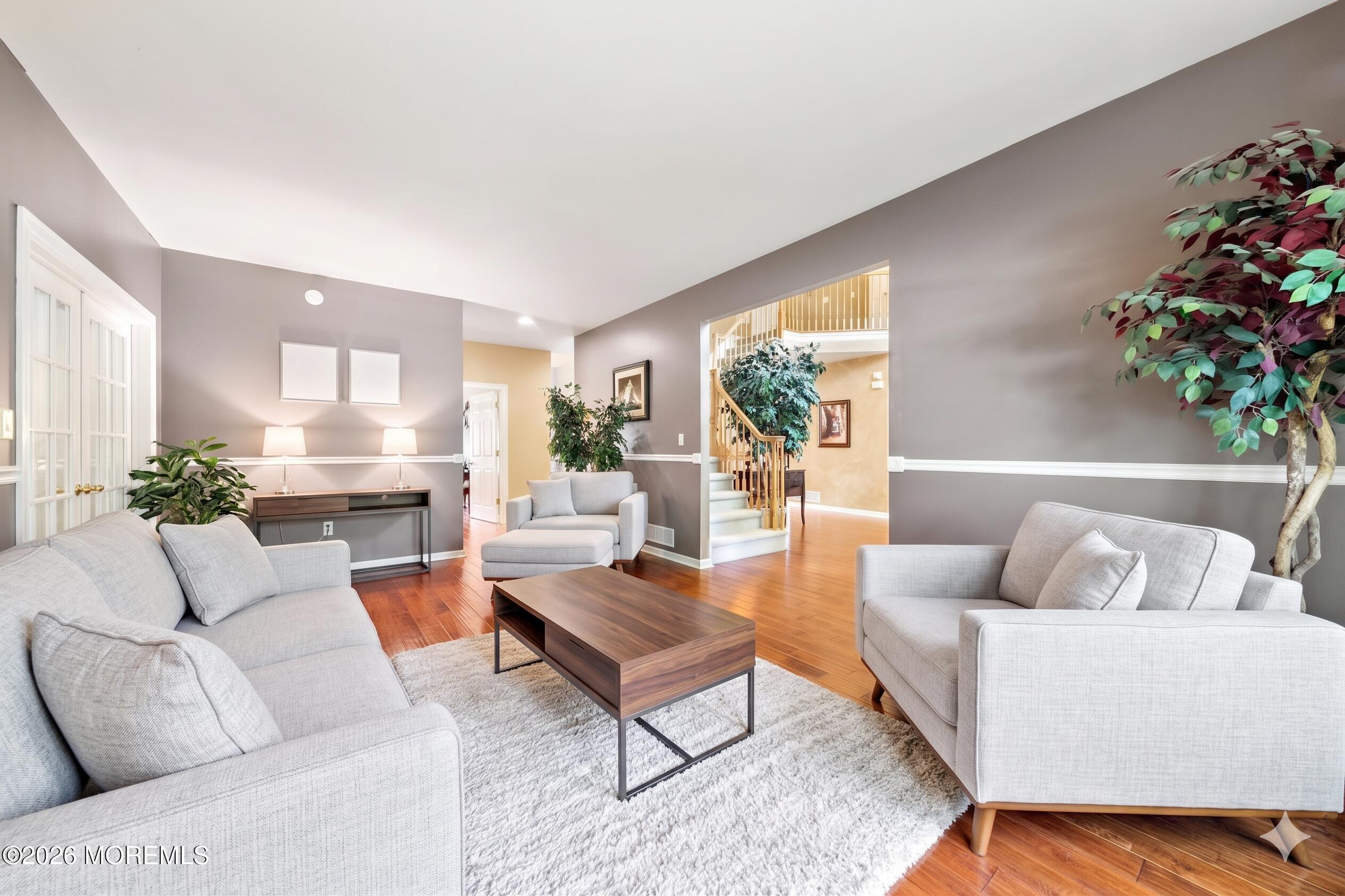 2 Mehar Court Jackson, NJ 08527 - Photo 13 of 47 a living room with furniture and a potted plant