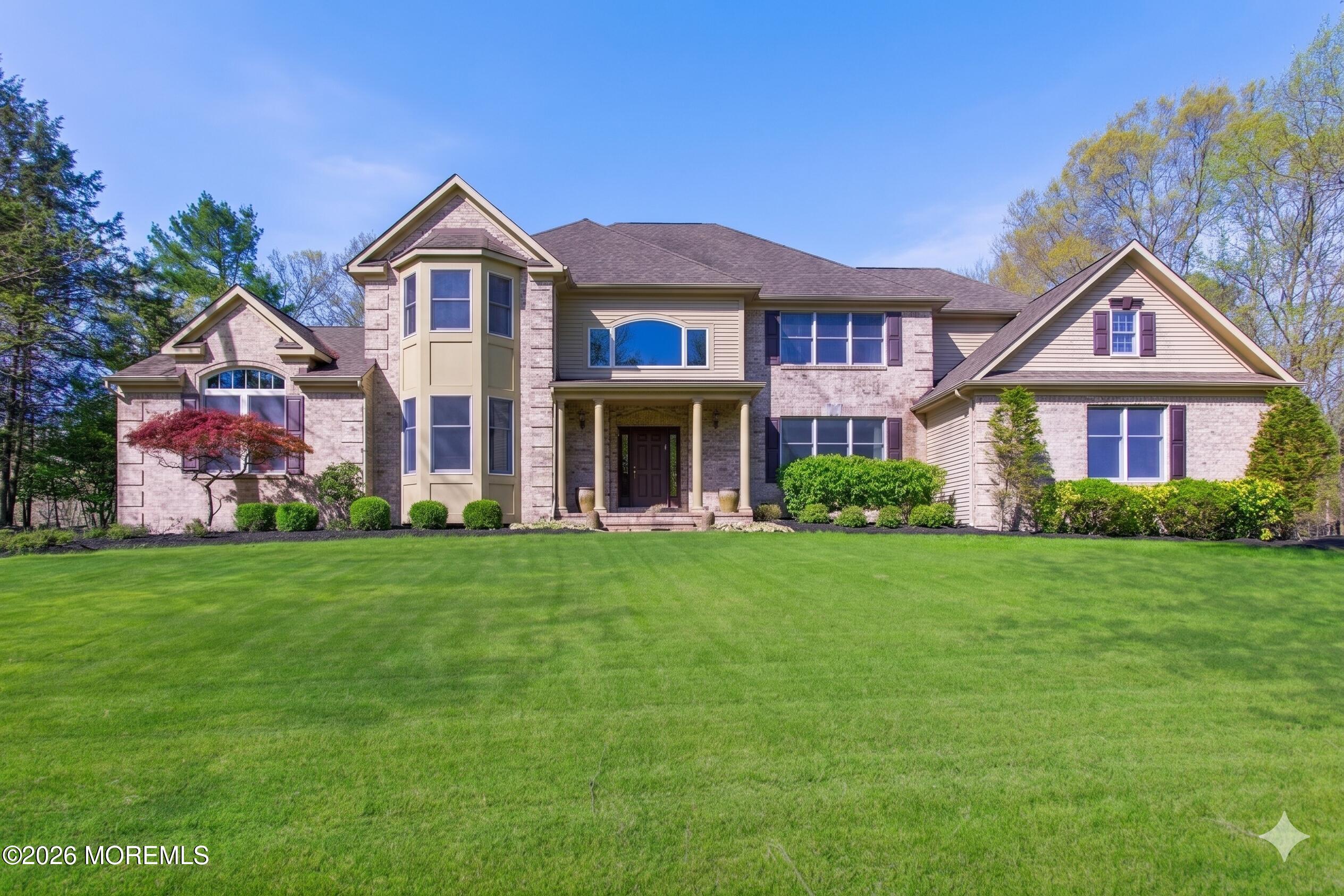 2 Mehar Court Jackson, NJ 08527 - Photo 2 of 47 a front view of a house with a yard