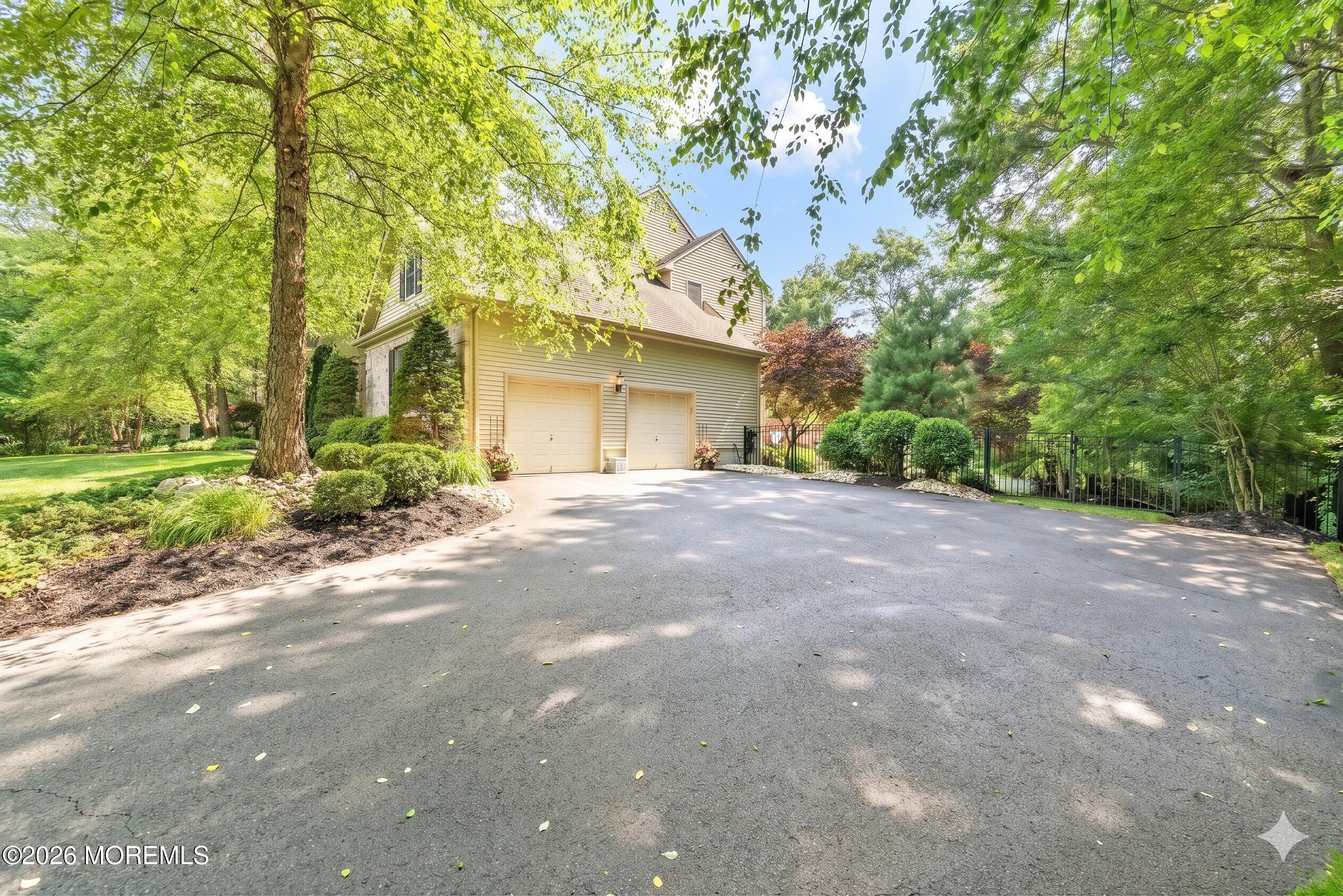 2 Mehar Court Jackson, NJ 08527 - Photo 36 of 47 a view of a house with a tree in front of it