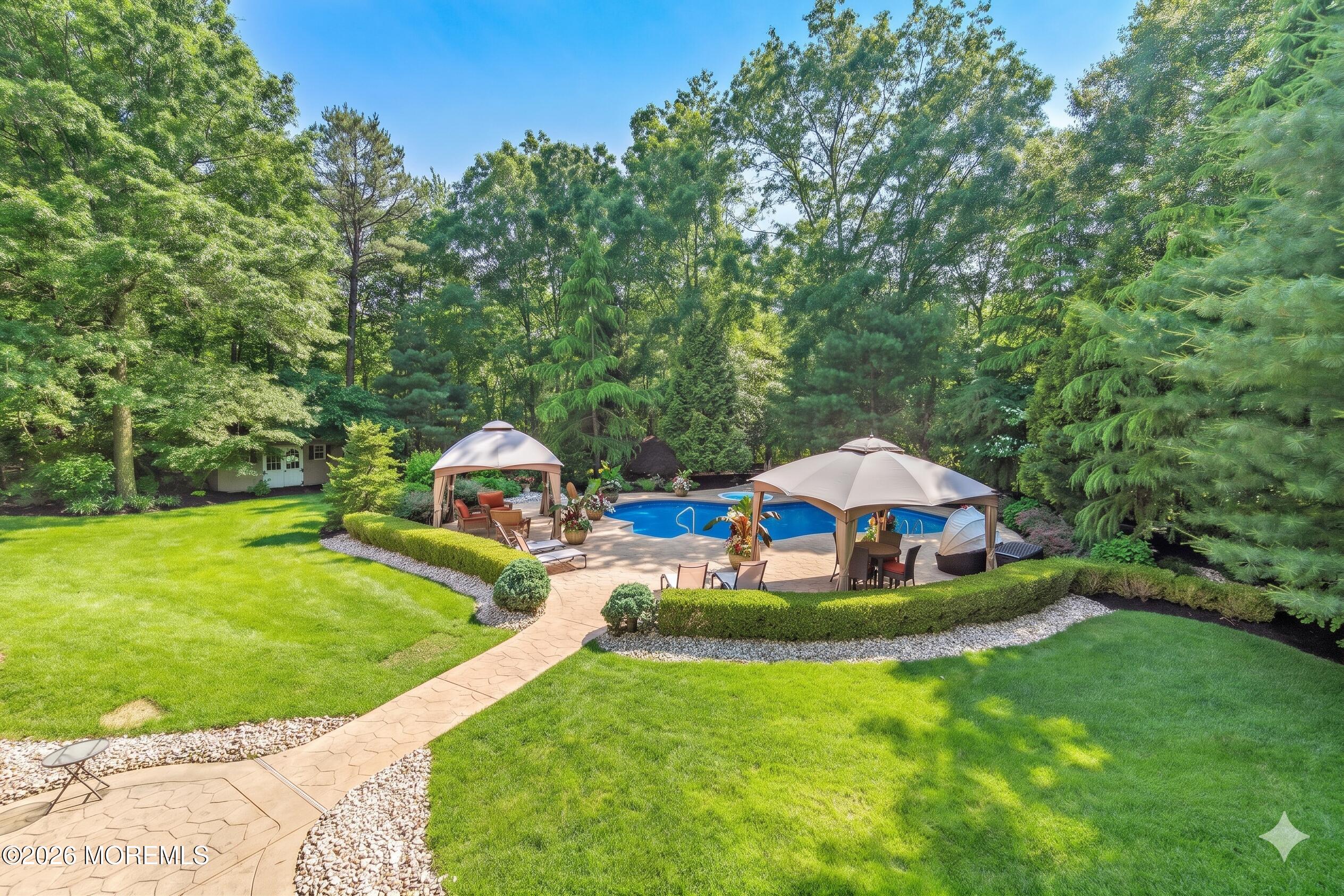 2 Mehar Court Jackson, NJ 08527 - Photo 40 of 47 a view of a wooden house with a yard and outdoor seating