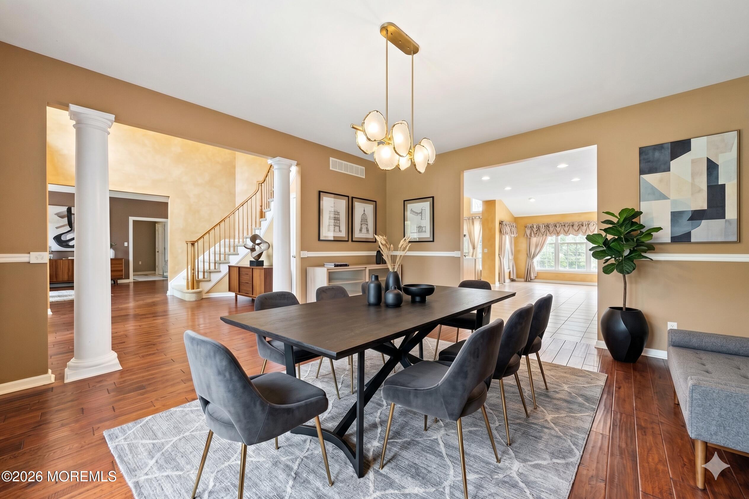 2 Mehar Court Jackson, NJ 08527 - Photo 7 of 47 a view of a dining room with furniture and wooden floor