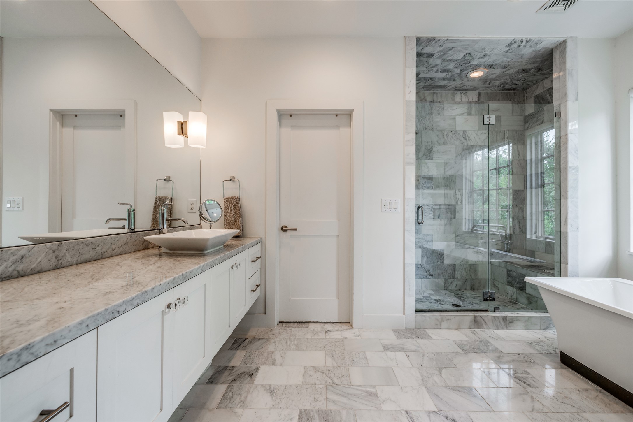 2815 Albans Road Houston, TX 77005 - Photo 37 of 50 Fabulous Spacious Primary Bathroom with high end marble counters, stand alone bath & large spacious Shower with marble time