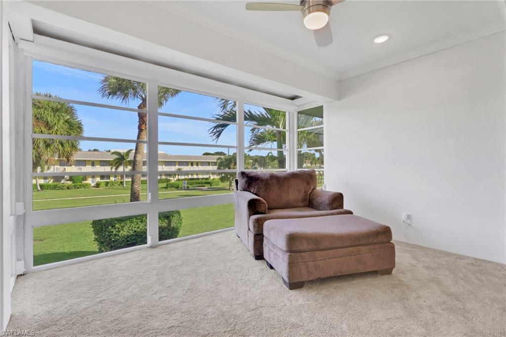 466 12th Avenue South, Unit 466 Naples, FL 34102 - Photo 22 of 34 a living room with furniture and garden