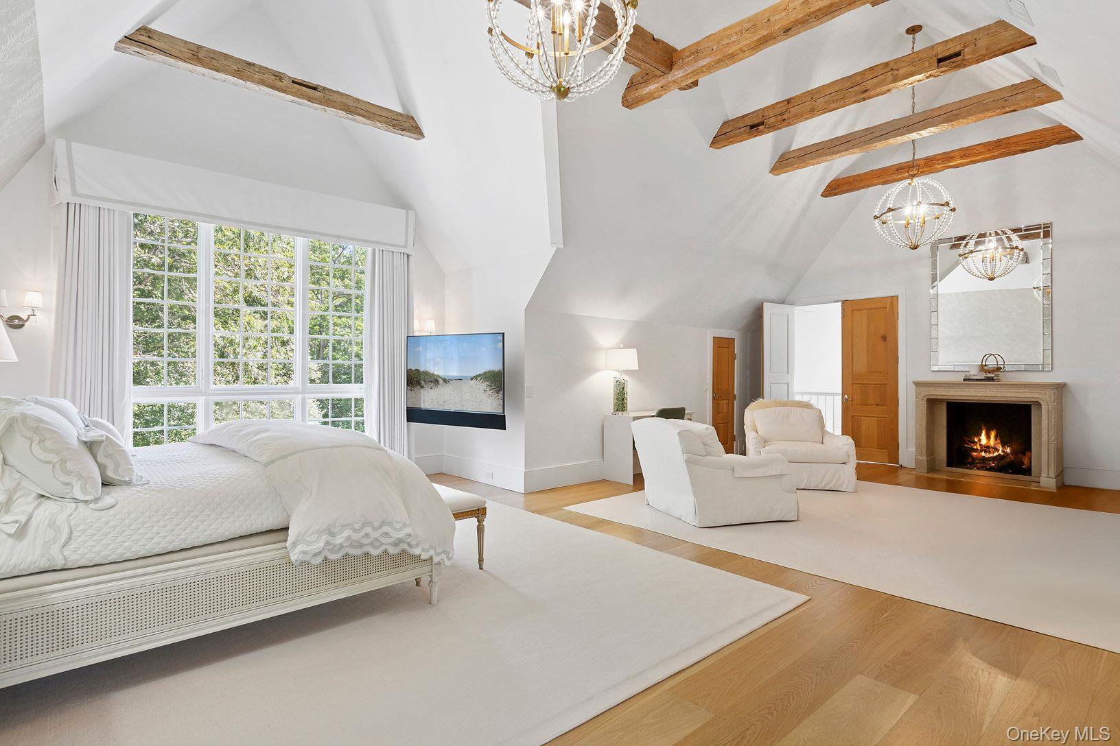 123 Abrahams Path East Hampton, NY 11937 - Photo 11 of 27 a living room with furniture and a fireplace