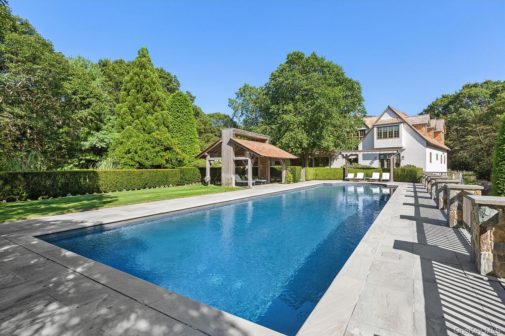 123 Abrahams Path East Hampton, NY 11937 - Photo 21 of 27 a view of a house with swimming pool