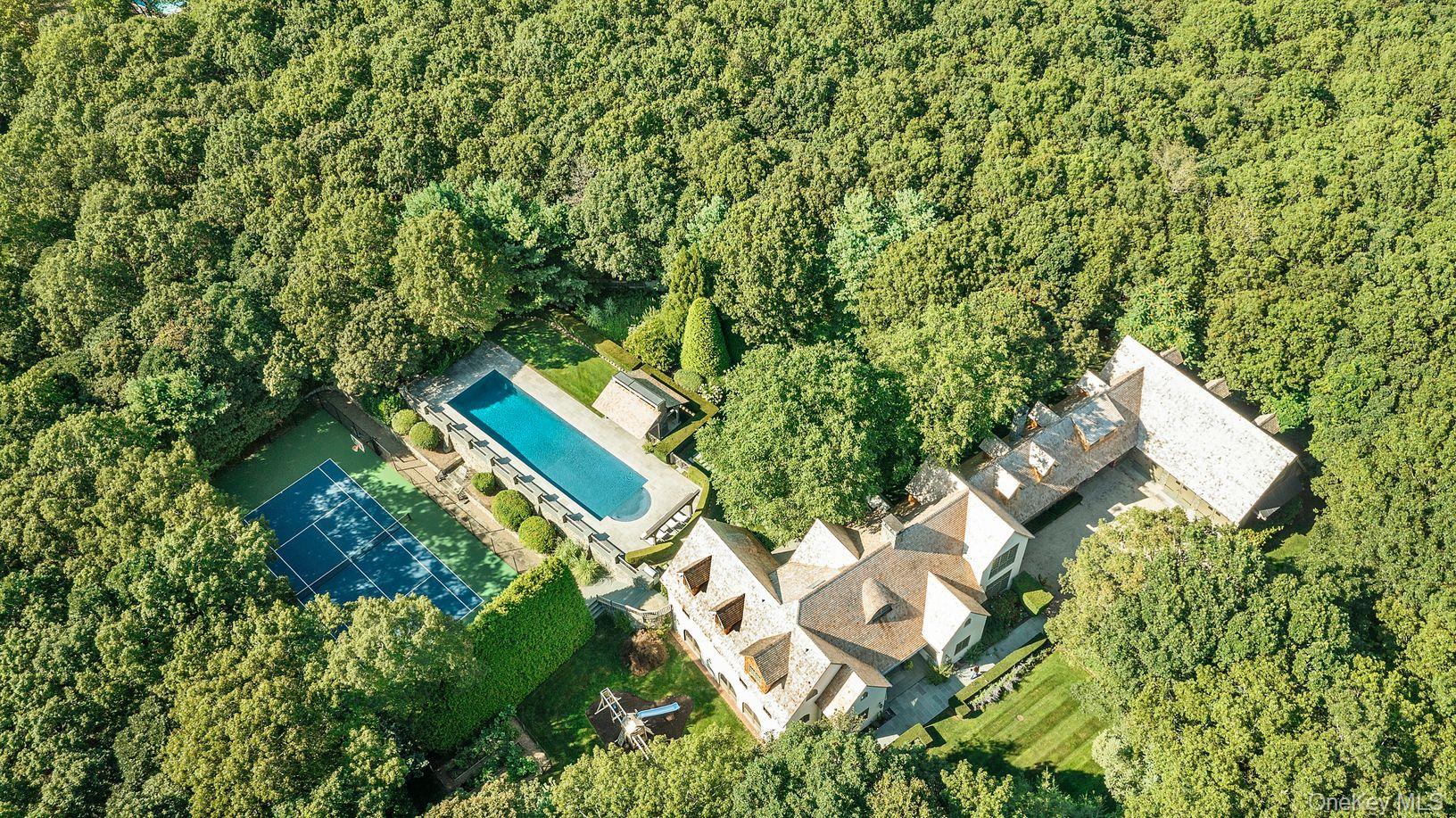 123 Abrahams Path East Hampton, NY 11937 - Photo 24 of 27 an aerial view of a house with a yard