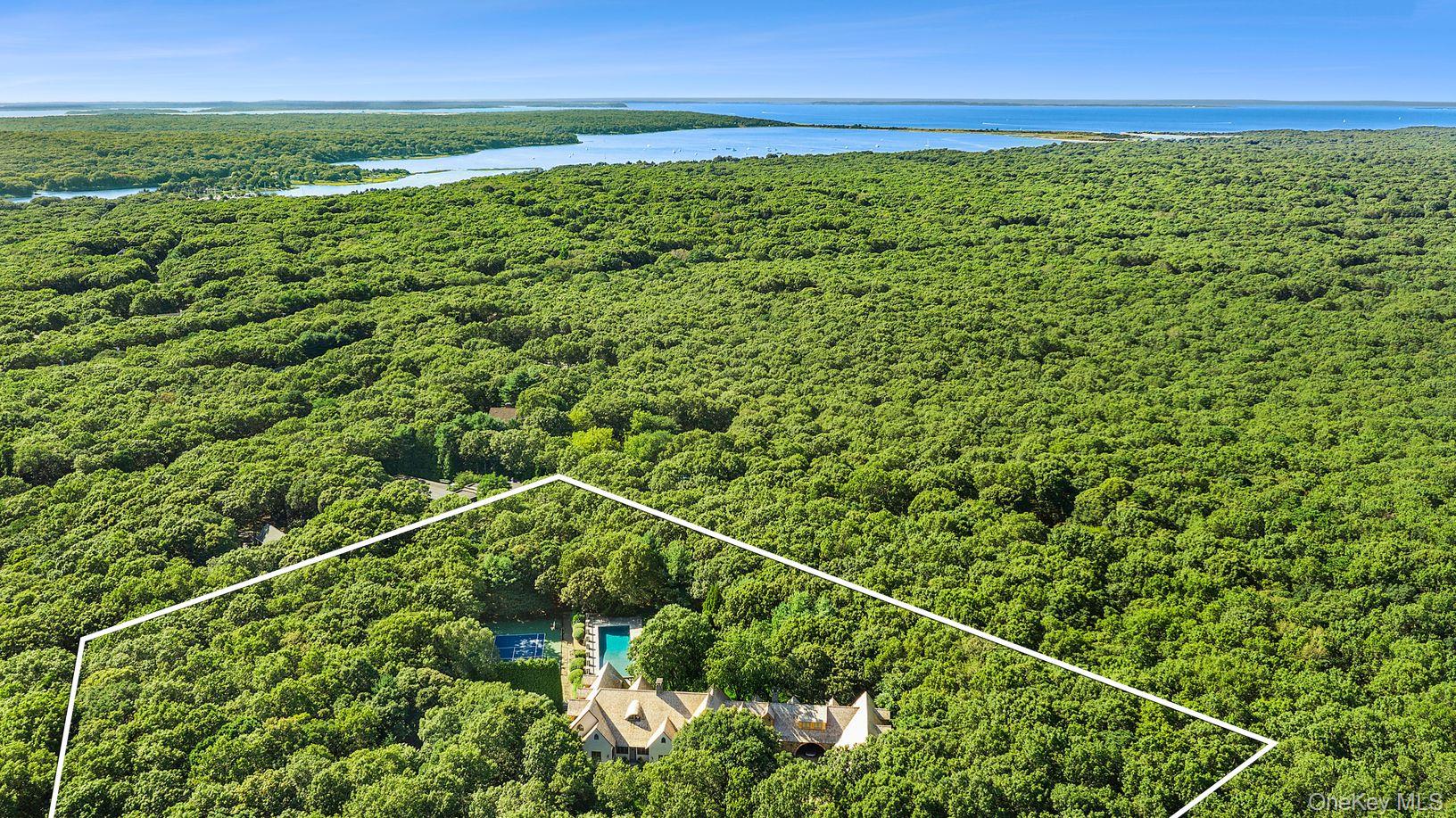 123 Abrahams Path East Hampton, NY 11937 - Photo 27 of 27 a view of a field with an outdoor space