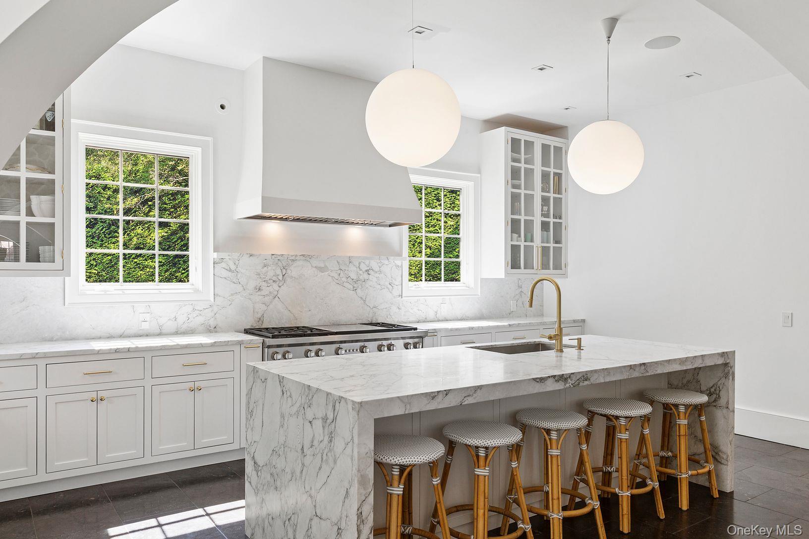 123 Abrahams Path East Hampton, NY 11937 - Photo 7 of 27 a kitchen with a sink cabinets and window