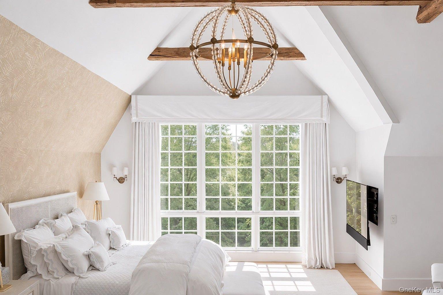 123 Abrahams Path East Hampton, NY 11937 - Photo 10 of 27 a bed room with a bed and a window