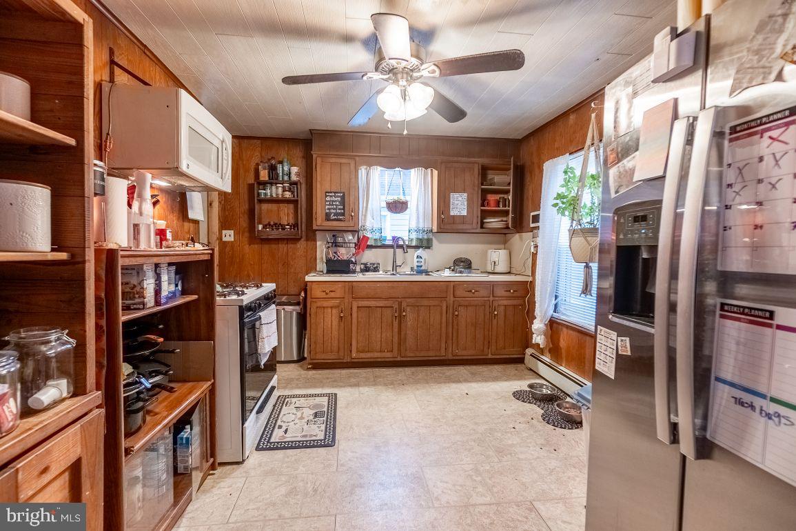 62 McKinley Avenue Hanover, PA 17331 - Photo 5 of 17 a view of a kitchen with appliances and cabinets