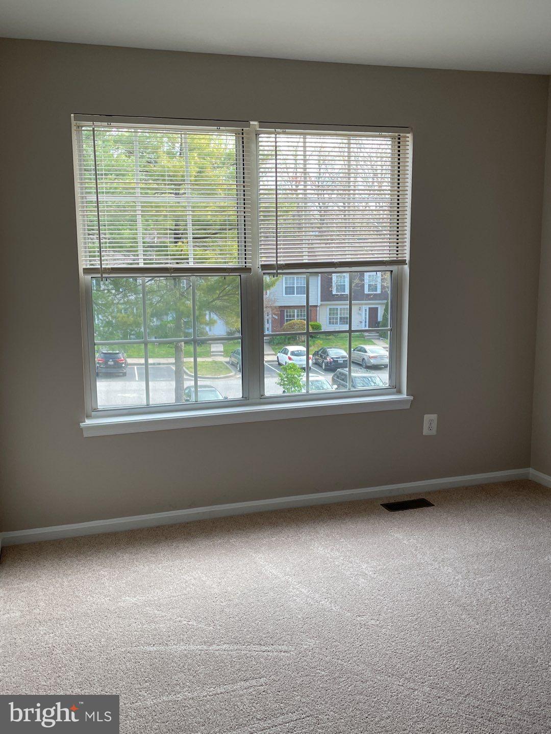 10366 College Square Columbia, MD 21044 - Photo 19 of 20 an empty room with a window