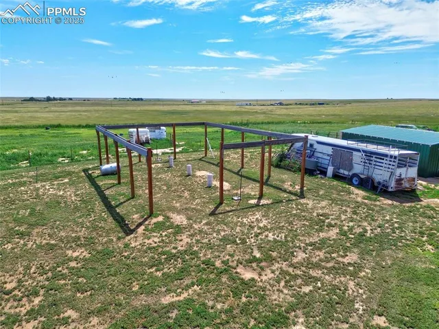 a view of a lake with a yard