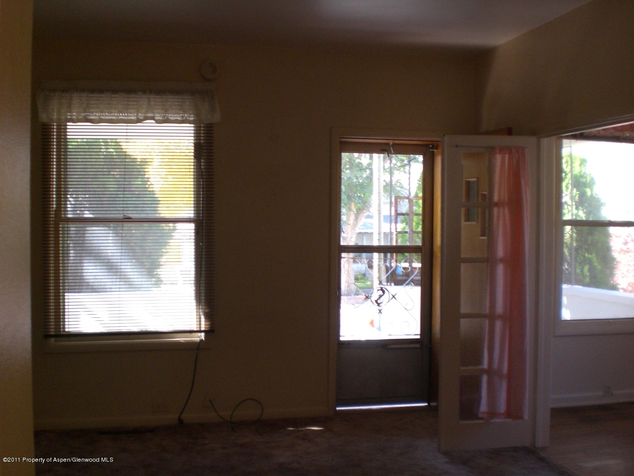 618 East Avenue Rifle, CO 81650 - Photo 5 of 30 a view of an empty room with a window