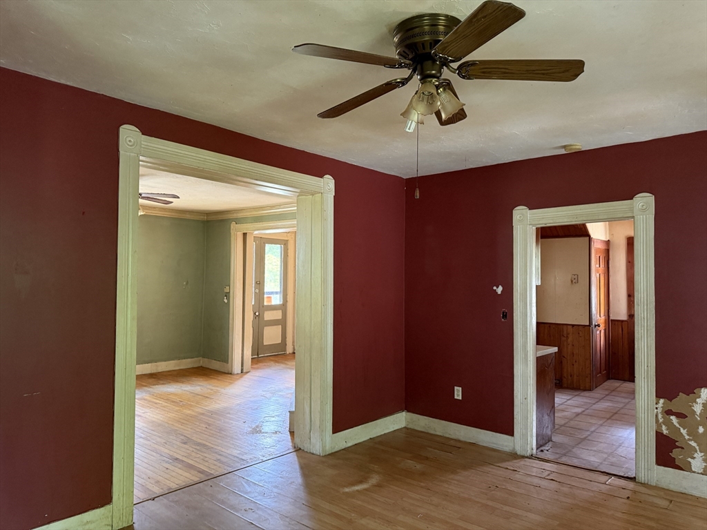 38 Elm Street Warren, MA 01083 - Photo 12 of 34 a view of empty room with wooden floor