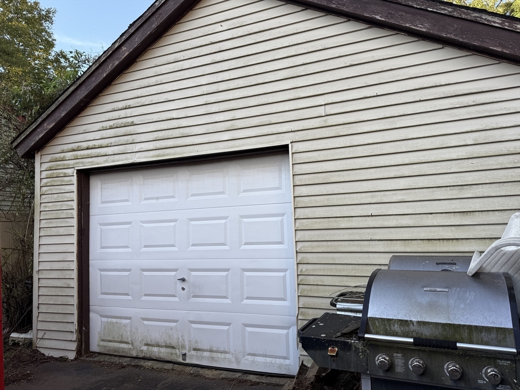 38 Elm Street Warren, MA 01083 - Photo 2 of 34 a view of a small house and a garage