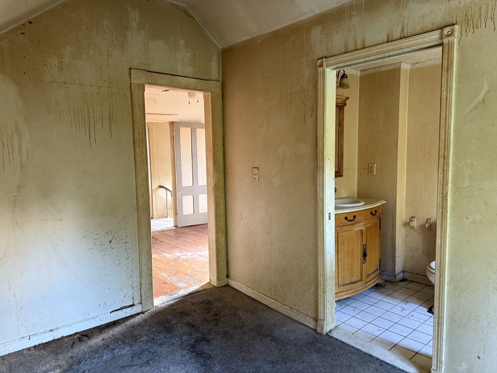 38 Elm Street Warren, MA 01083 - Photo 24 of 34 a view of a hallway with wooden floor