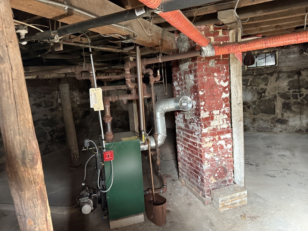 38 Elm Street Warren, MA 01083 - Photo 32 of 34 a view of walk in closet with clothes and shoes