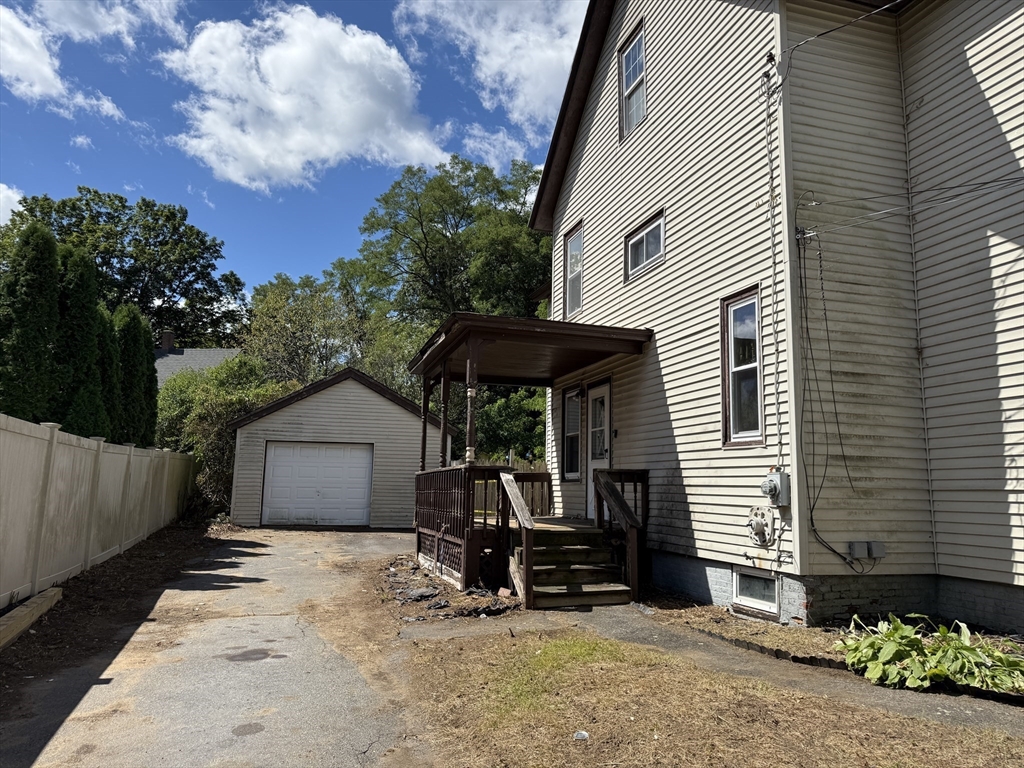 38 Elm Street Warren, MA 01083 - Photo 8 of 34 a view of house with backyard space and balcony