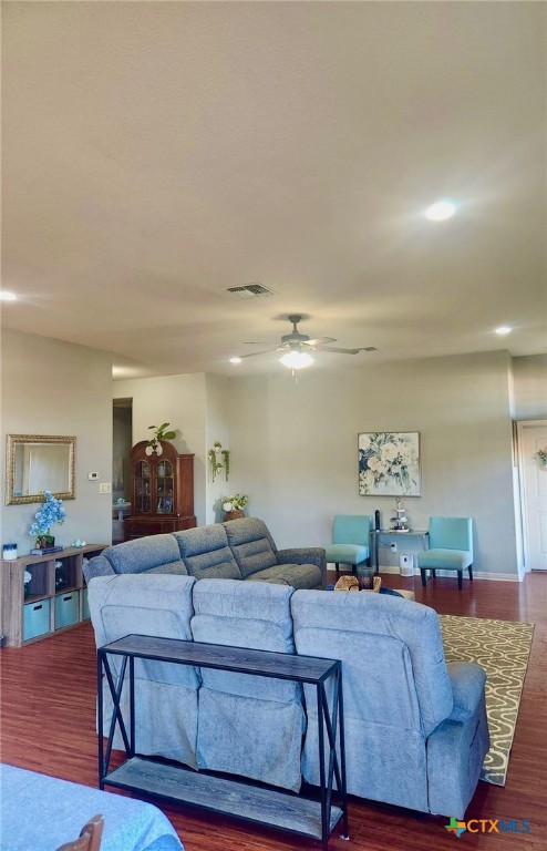 91 Skyview Terrace Leander, TX 78641 - Photo 11 of 25 a living room with furniture and wooden floor