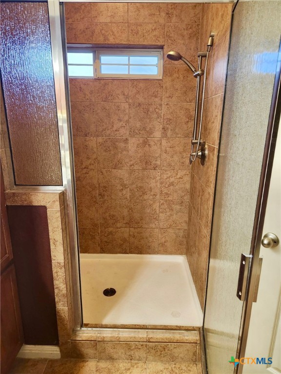 91 Skyview Terrace Leander, TX 78641 - Photo 22 of 25 a bathroom with a shower