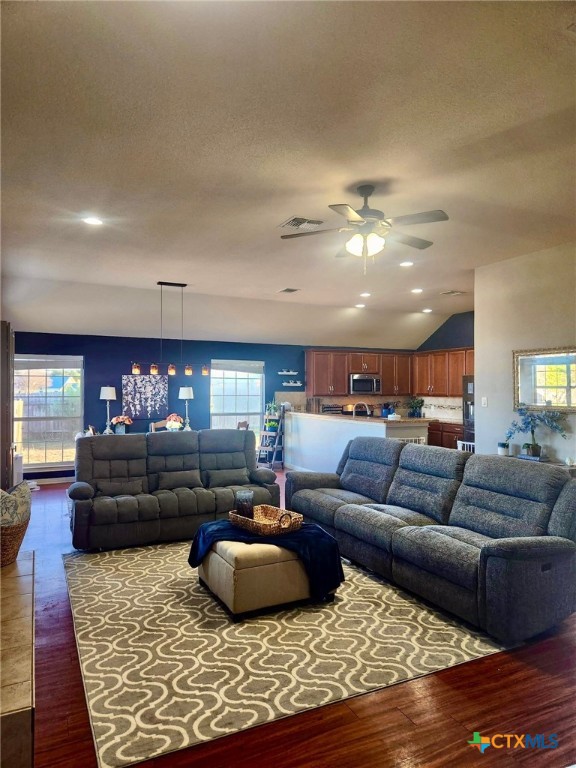 91 Skyview Terrace Leander, TX 78641 - Photo 9 of 25 a living room with furniture and a couch