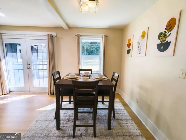 a view of a dining room with furniture