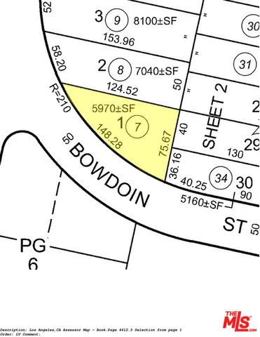 an aerial view of a swimming pool with outdoor seating